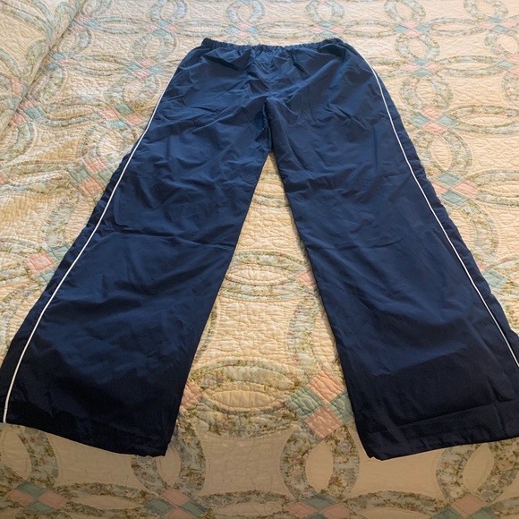 Track pants with white piping, slick material - Picture 3 of 7